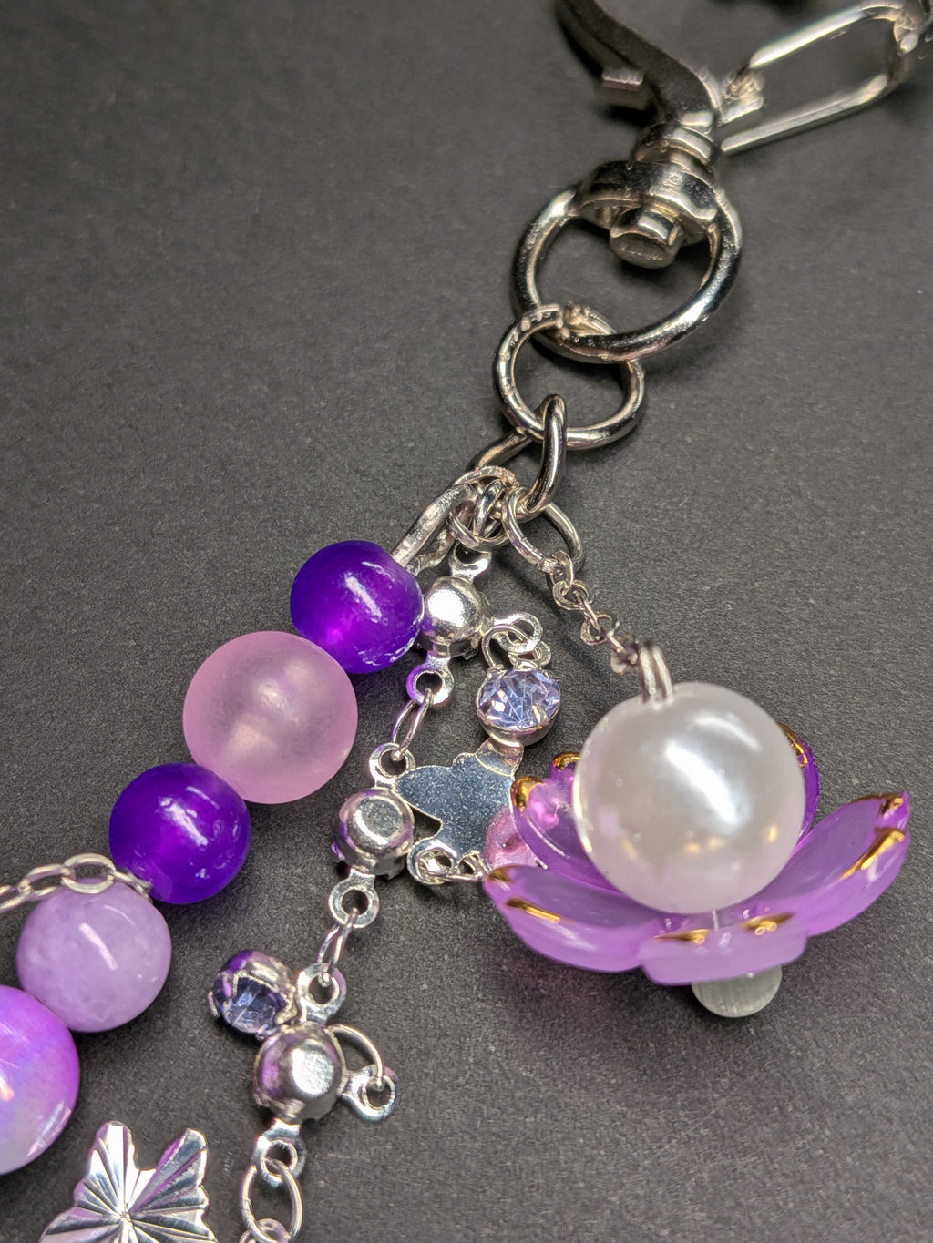 Purple flower bag charm